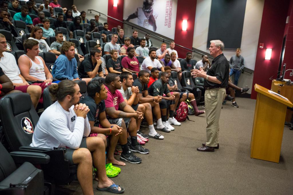 President John Thrasher talks to the FSU football team July 13, 2015, at the Moore Athletics Center. (FSU Photography Services)