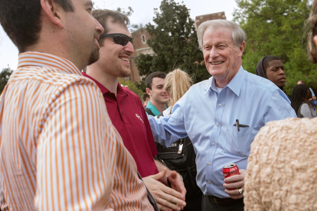 President John Thrasher talks with students during the President's Ice Cream Social on Landis Green April 6, 2016. (FSU Photography Services)