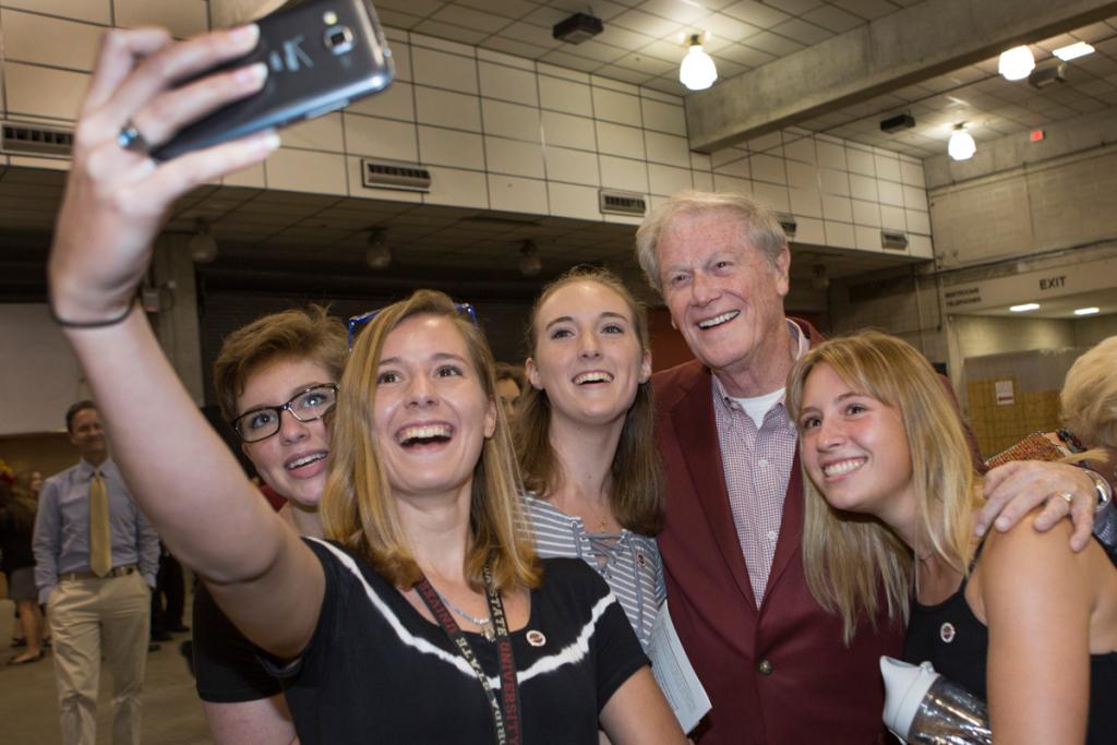 President Thrasher takes selfies with students following New Student Convocation at the Donald L. Tucker Civic Center Aug. 28, 2016. (FSU Photography Services)