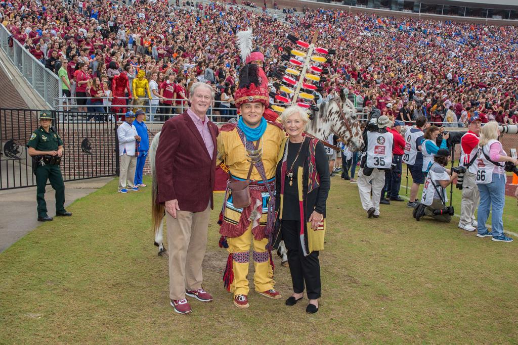 President John Thrasher and FSU First Lady Jean Thrasher with Kyle Doney of the Seminole Tribe of Florida during the FSU-UF football game Nov. 24, 2018 at Doak S. Campbell Stadium. (FSU Photography Services)